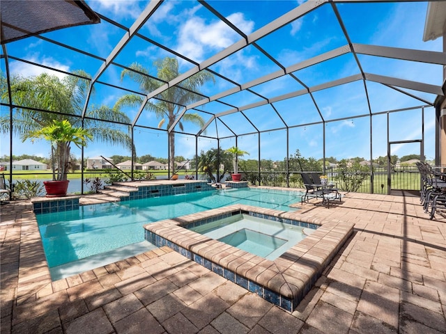 2454 Black Lake Blvd, Winter Garden, FL 34787 - view of swimming pool with glass enclosure, a patio area, and a pool with connected hot tub