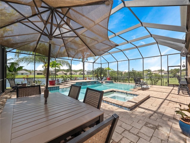 2454 Black Lake Blvd, Winter Garden, FL 34787 - view of patio featuring glass enclosure, outdoor dining space, and a pool with connected hot tub