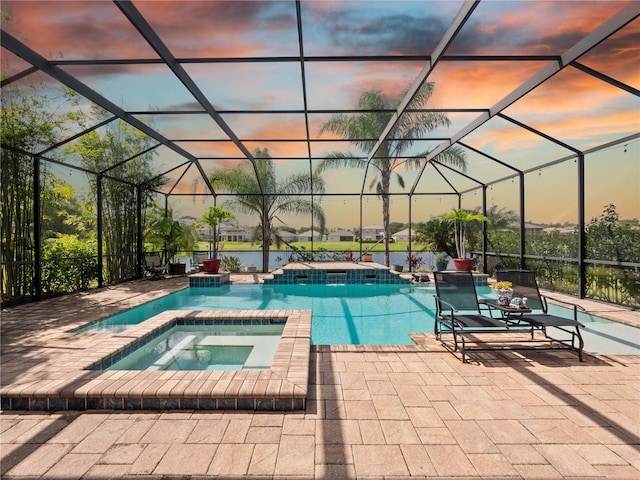 2454 Black Lake Blvd, Winter Garden, FL 34787 - view of swimming pool featuring a patio area, a pool with connected hot tub, and a lanai