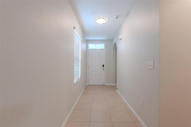 12104 Fawn Brindle St, Riverview, FL 33578 - hall featuring arched walkways and light tile patterned flooring