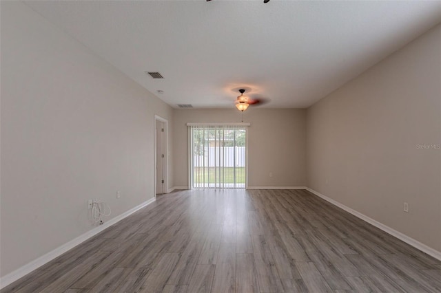 12104 Fawn Brindle St, Riverview, FL 33578 - unfurnished room with ceiling fan and wood finished floors