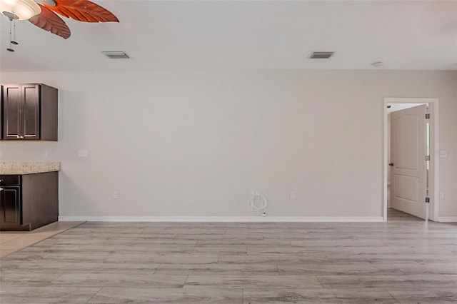 12104 Fawn Brindle St, Riverview, FL 33578 - unfurnished living room with a ceiling fan and light wood-style flooring