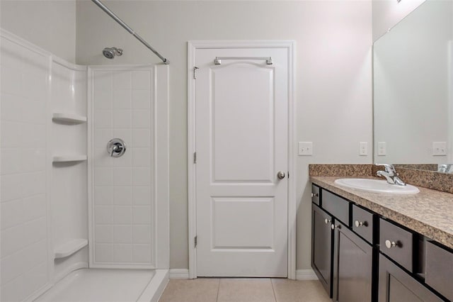 12104 Fawn Brindle St, Riverview, FL 33578 - bathroom featuring a shower, vanity, and tile patterned flooring