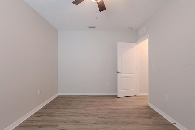 12104 Fawn Brindle St, Riverview, FL 33578 - empty room with a ceiling fan and light wood finished floors