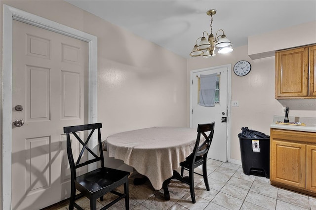 770 W Webster Ave, Winter Park, FL 32789 - dining space featuring a chandelier and light tile patterned floors