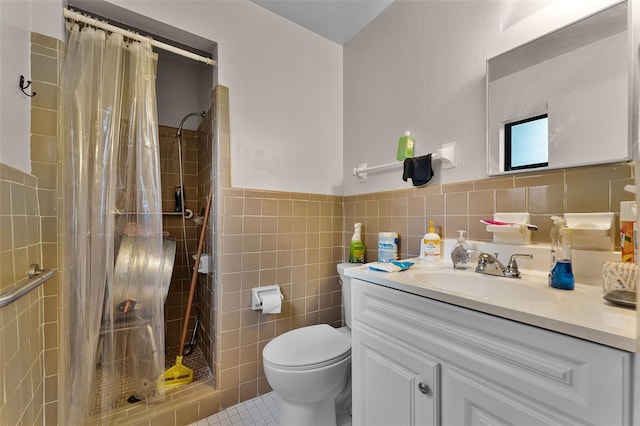 770 W Webster Ave, Winter Park, FL 32789 - full bathroom with tile walls, vanity, a shower stall, tile patterned floors, and a wainscoted wall