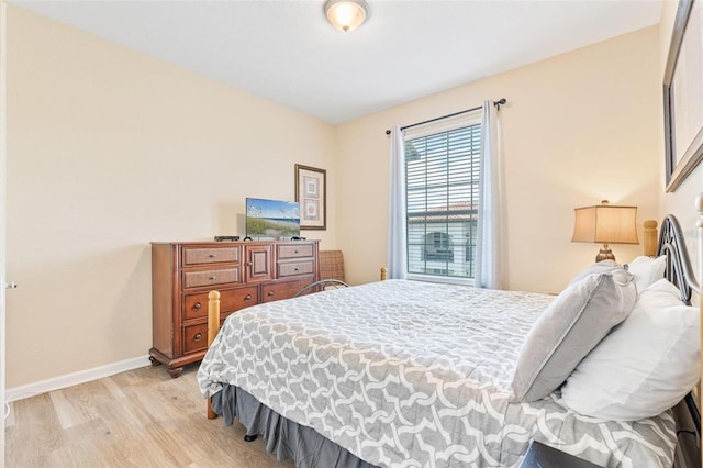 4024 Breakview Dr Unit 402, Orlando, FL 32819 - bedroom featuring light wood-type flooring and baseboards