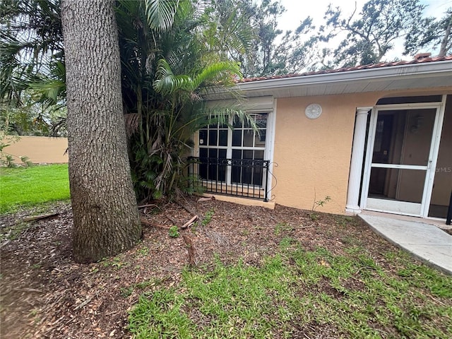131 49th Ct E, Palmetto, FL 34221 - view of home's exterior with stucco siding