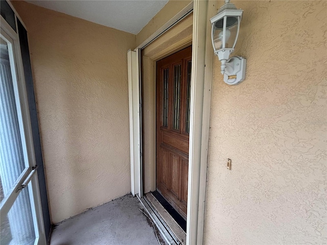 131 49th Ct E, Palmetto, FL 34221 - doorway to property with stucco siding