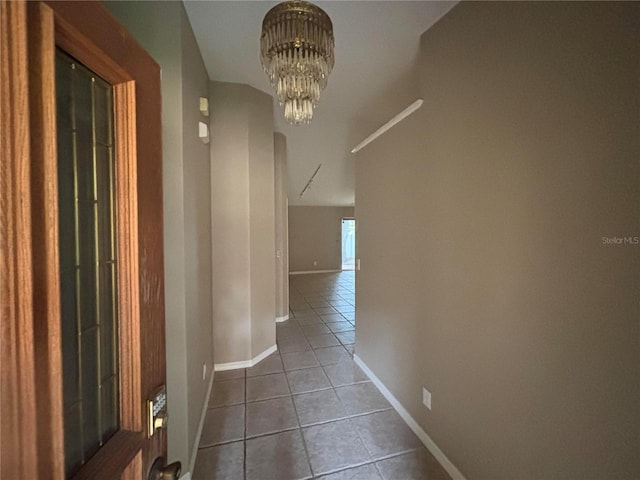 131 49th Ct E, Palmetto, FL 34221 - hall featuring tile patterned flooring and a chandelier
