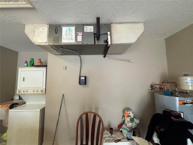 131 49th Ct E, Palmetto, FL 34221 - laundry room featuring stacked washing machine and dryer, a textured ceiling, and gas water heater