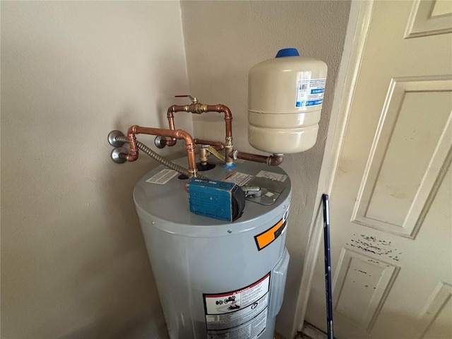 131 49th Ct E, Palmetto, FL 34221 - utility room with electric water heater