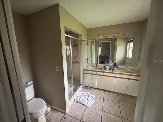 131 49th Ct E, Palmetto, FL 34221 - full bath featuring double vanity, a stall shower, and tile patterned flooring