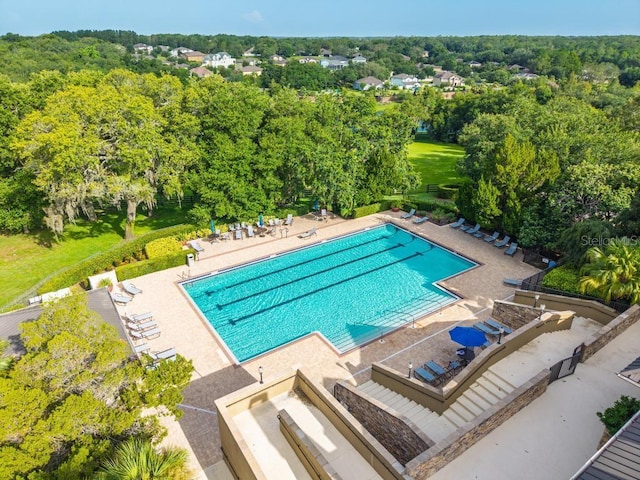 30120 Hackney Loop, Mount Dora, FL 32757 - community pool featuring a patio