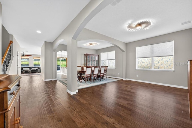 30120 Hackney Loop, Mount Dora, FL 32757 - entryway featuring dark wood-style flooring, stairway, and healthy amount of natural light