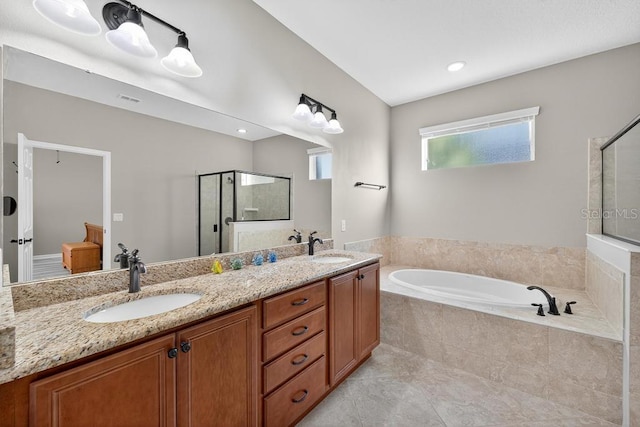 30120 Hackney Loop, Mount Dora, FL 32757 - bathroom with a stall shower, a bath, and double vanity