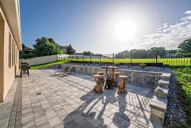 30120 Hackney Loop, Mount Dora, FL 32757 - fenced backyard featuring a patio area