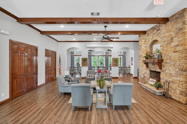 30120 Hackney Loop, Mount Dora, FL 32757 - living room with ceiling fan, arched walkways, wood finished floors, beam ceiling, and recessed lighting