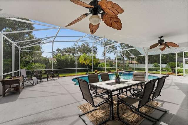 5949 Broken Bow Ln, Port Orange, FL 32127 - view of patio / terrace featuring a ceiling fan, a pool with connected hot tub, and glass enclosure