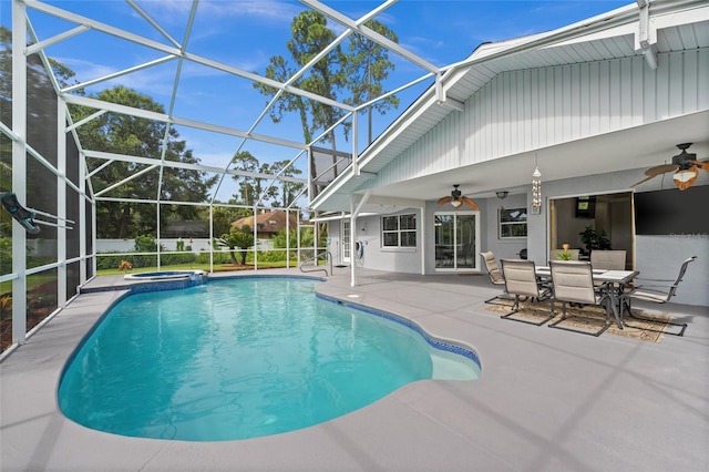 5949 Broken Bow Ln, Port Orange, FL 32127 - view of pool featuring ceiling fan, a patio area, a lanai, and a pool with connected hot tub