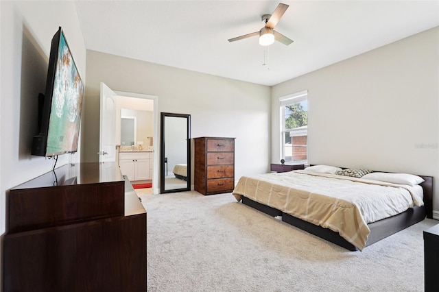430 Baker Ave, Lake Helen, FL 32744 - bedroom with light carpet, ensuite bathroom, and a ceiling fan