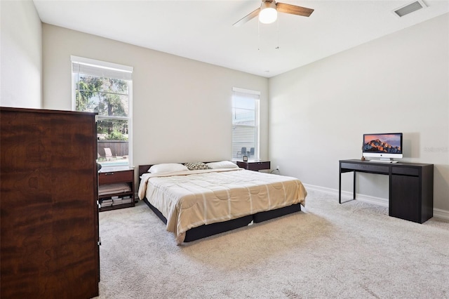 430 Baker Ave, Lake Helen, FL 32744 - carpeted bedroom featuring baseboards and ceiling fan
