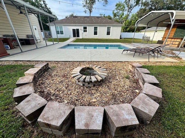 430 Baker Ave, Lake Helen, FL 32744 - view of swimming pool with an outdoor fire pit and a patio