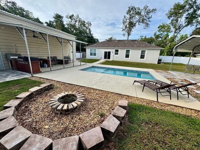 430 Baker Ave, Lake Helen, FL 32744 - view of pool featuring an outdoor fire pit, a patio area, and a ceiling fan
