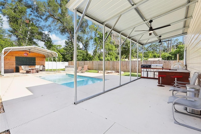 430 Baker Ave, Lake Helen, FL 32744 - view of swimming pool featuring area for grilling, a fenced backyard, a bar, a patio, and ceiling fan