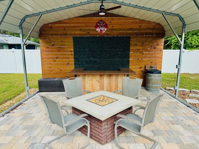430 Baker Ave, Lake Helen, FL 32744 - view of patio / terrace with a fire pit