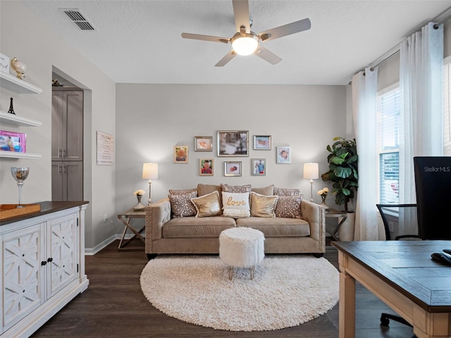 14903 Ellingsworth Ln, Winter Garden, FL 34787 - living room featuring ceiling fan and dark wood-style flooring