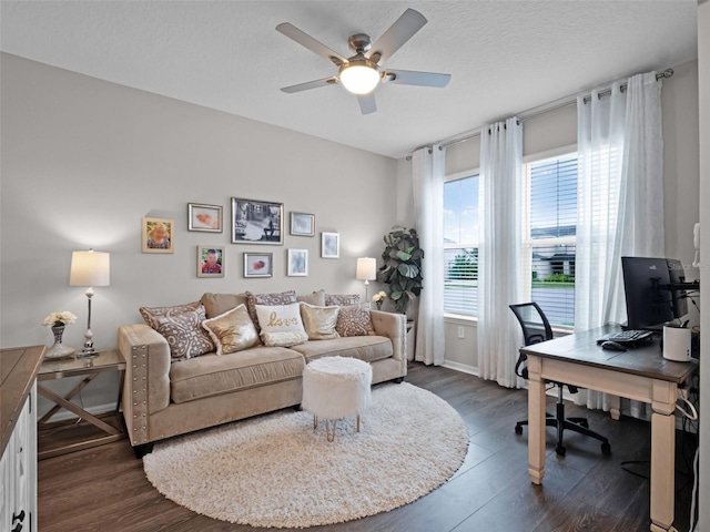 14903 Ellingsworth Ln, Winter Garden, FL 34787 - living room with a ceiling fan, a desk, and dark wood finished floors