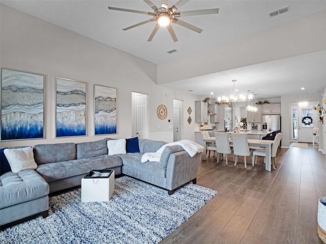 14903 Ellingsworth Ln, Winter Garden, FL 34787 - living area with a chandelier, a ceiling fan, and light wood-style floors