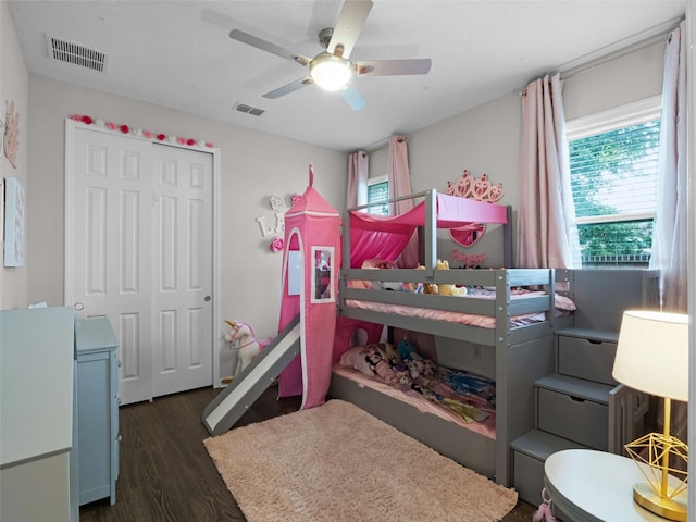 14903 Ellingsworth Ln, Winter Garden, FL 34787 - bedroom with dark wood-style floors, a closet, and a ceiling fan