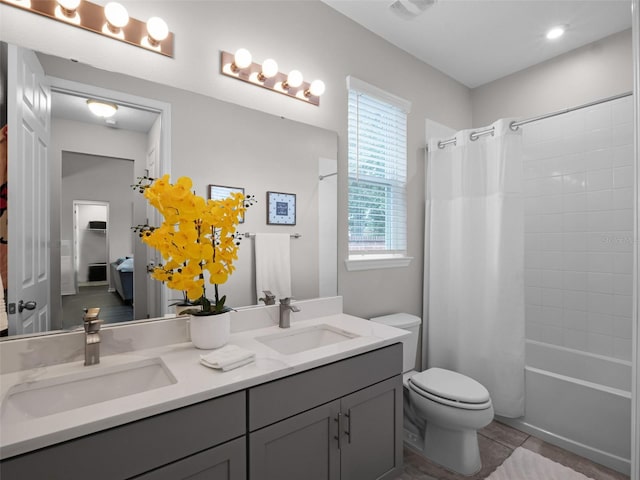 14903 Ellingsworth Ln, Winter Garden, FL 34787 - full bath with double vanity, tile patterned flooring, and shower / tub combo with curtain