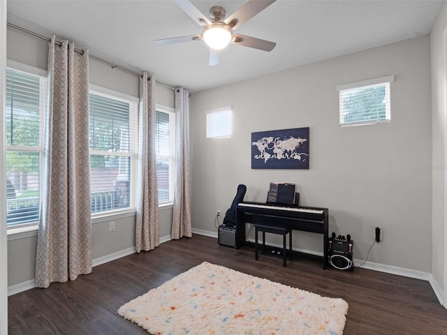 14903 Ellingsworth Ln, Winter Garden, FL 34787 - sitting room with dark wood-style flooring, plenty of natural light, and ceiling fan