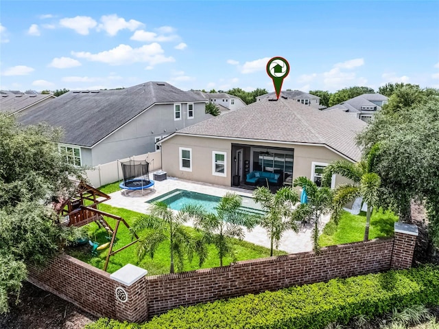 14903 Ellingsworth Ln, Winter Garden, FL 34787 - rear view of house featuring stucco siding, a patio, a ceiling fan, and a shingled roof