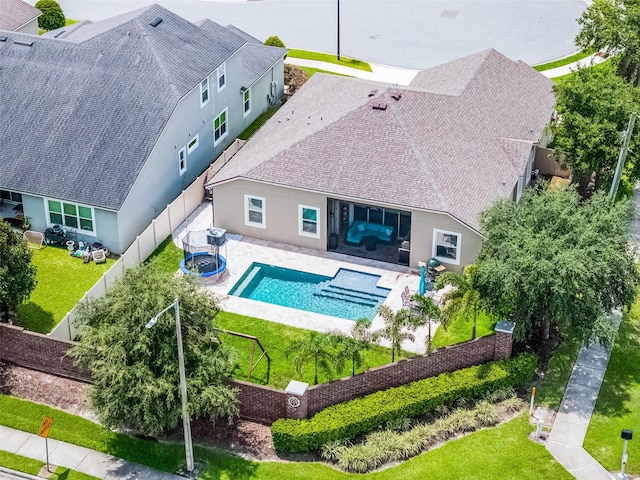 14903 Ellingsworth Ln, Winter Garden, FL 34787 - rear view of house featuring stucco siding, a shingled roof, a fenced backyard, and a patio