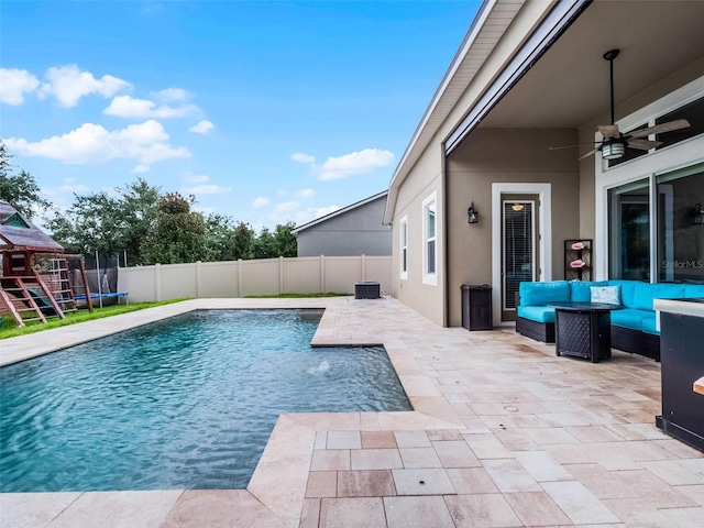 14903 Ellingsworth Ln, Winter Garden, FL 34787 - view of swimming pool featuring a patio, a fenced backyard, ceiling fan, an outdoor living space, and a trampoline