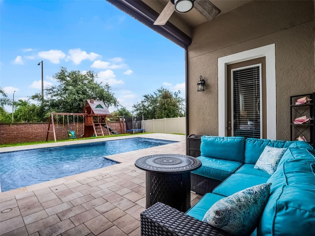 14903 Ellingsworth Ln, Winter Garden, FL 34787 - view of swimming pool with outdoor lounge area, a patio area, a fenced backyard, and a playground