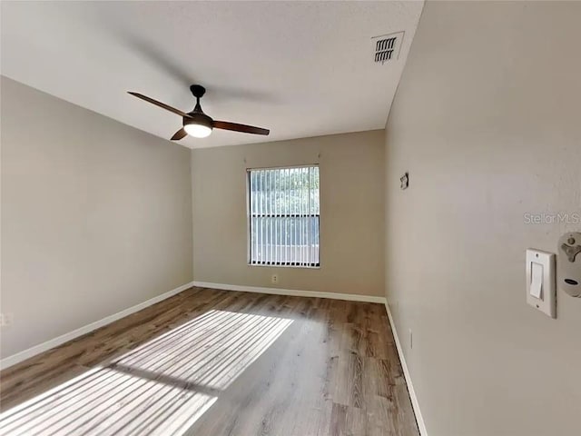 1709 Shady Ridge Ct Unit 243, Orlando, FL 32807 - spare room with wood finished floors and ceiling fan