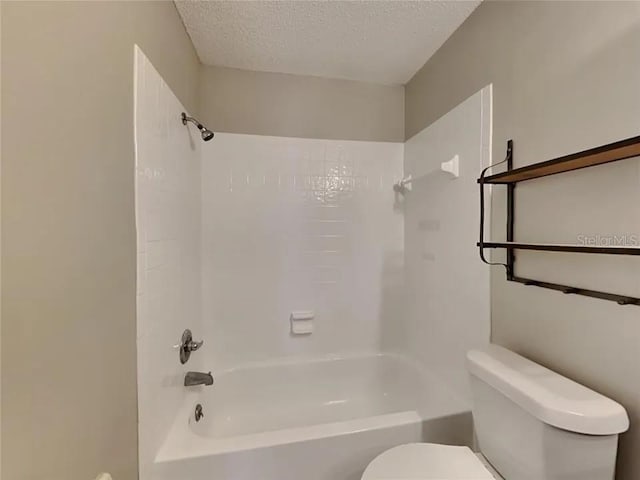 1709 Shady Ridge Ct Unit 243, Orlando, FL 32807 - full bathroom featuring tub / shower combination and a textured ceiling