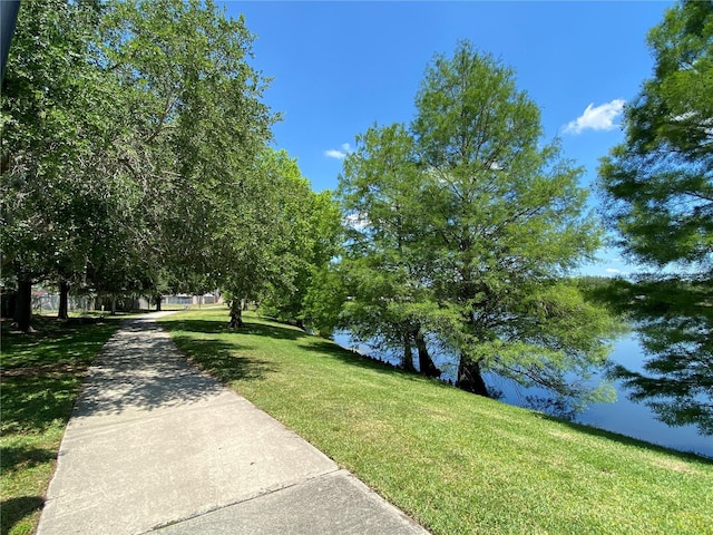1709 Shady Ridge Ct Unit 243, Orlando, FL 32807 - view of community with a lawn