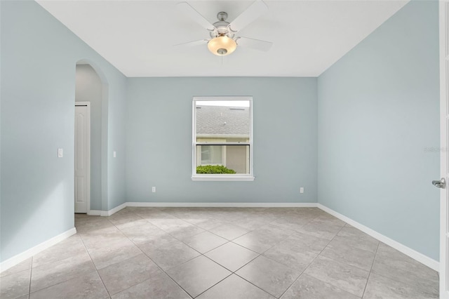7540 Bishop Square Dr, Winter Garden, FL 34787 - tiled spare room featuring a ceiling fan and arched walkways