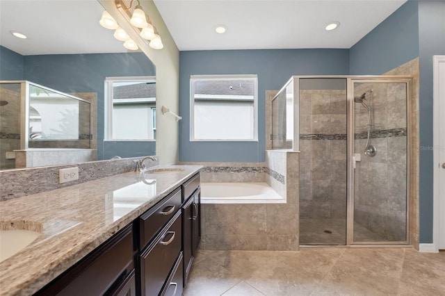 7540 Bishop Square Dr, Winter Garden, FL 34787 - full bathroom with a bath, a shower stall, double vanity, and tile patterned flooring