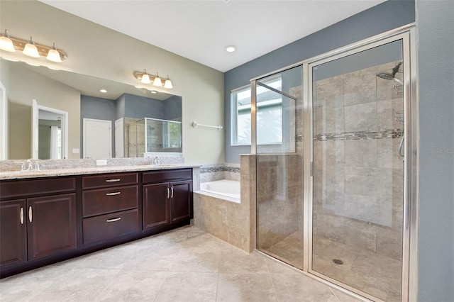 7540 Bishop Square Dr, Winter Garden, FL 34787 - full bathroom featuring a stall shower, double vanity, a bath, and tile patterned floors