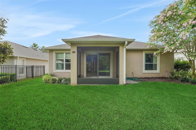7540 Bishop Square Dr, Winter Garden, FL 34787 - rear view of property with stucco siding, a sunroom, and roof with shingles