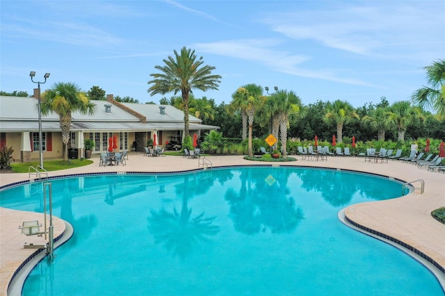 7540 Bishop Square Dr, Winter Garden, FL 34787 - community pool with a patio and french doors