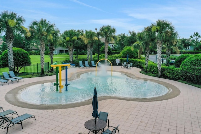 7540 Bishop Square Dr, Winter Garden, FL 34787 - community pool with a water play area and a patio