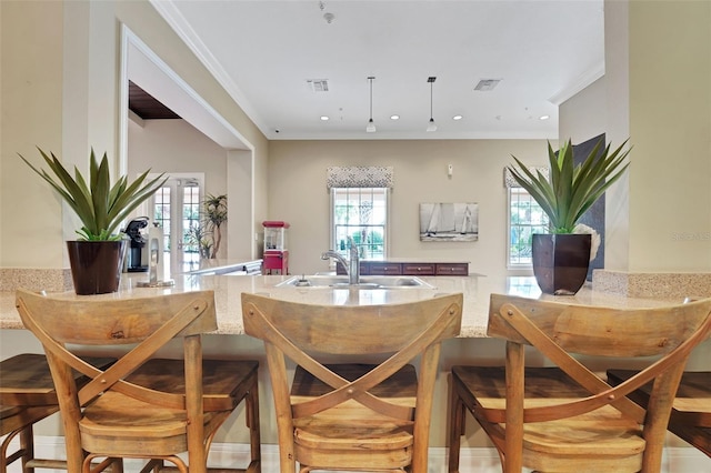 7540 Bishop Square Dr, Winter Garden, FL 34787 - kitchen featuring recessed lighting and ornamental molding